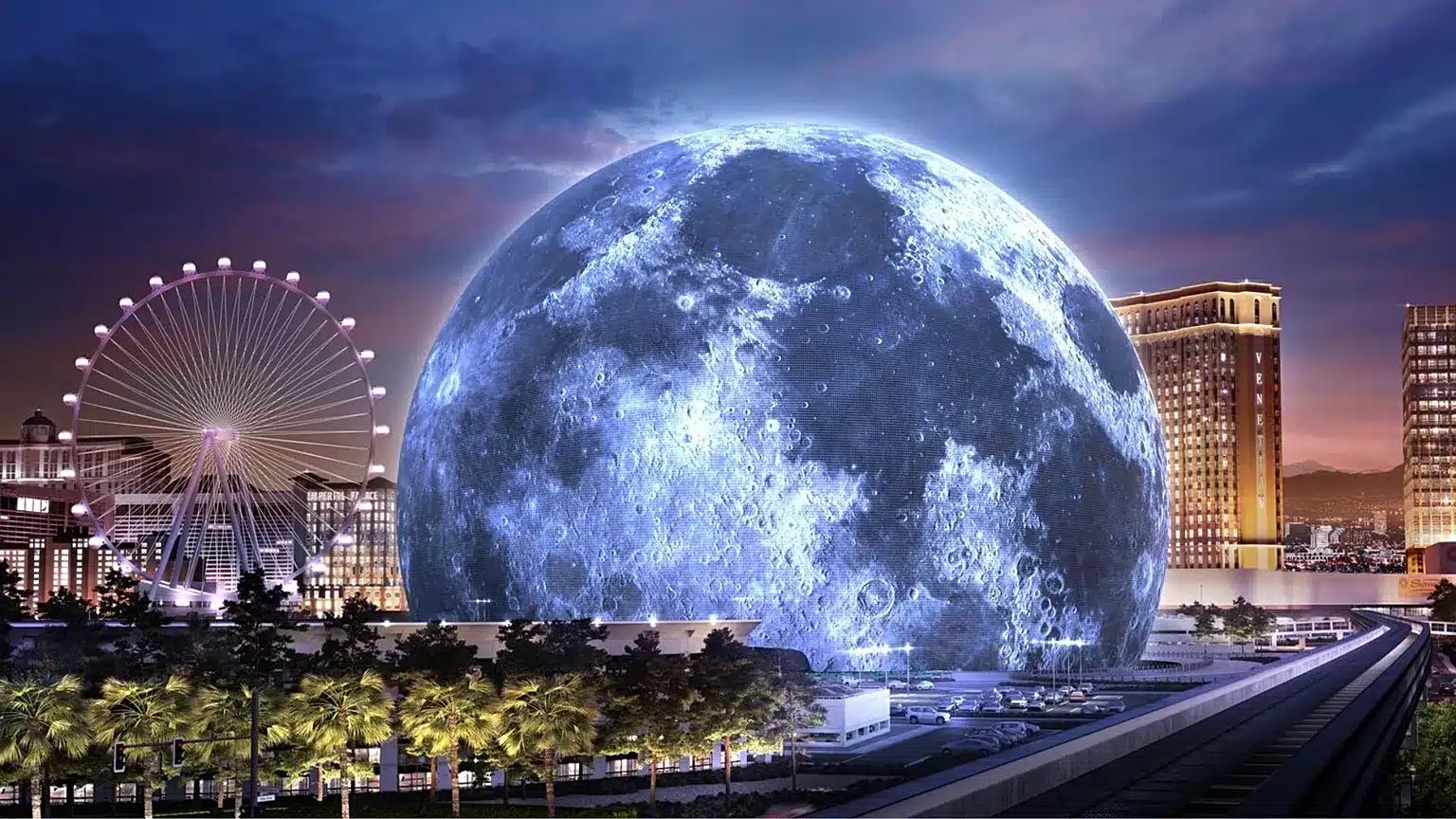 The Sphere and the moon over the Las Vegas skyline
